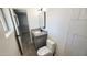 Bathroom features a tiled shower, modern vanity and sink, next to the toilet at 4219 W Citrus Way, Phoenix, AZ 85019