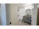 Updated bathroom with granite vanity, tile floors, new fixtures, and a shower-tub combination at 4219 W Citrus Way, Phoenix, AZ 85019