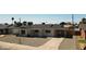 Charming single-story home with a well-maintained front yard and a covered parking area at 4219 W Citrus Way, Phoenix, AZ 85019