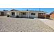 Charming single-story home featuring an inviting front porch, rock landscaping, and a covered parking area at 4219 W Citrus Way, Phoenix, AZ 85019