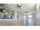 Open-concept living space featuring recessed lights, ceiling fans, and a view of the kitchen at 4219 W Citrus Way, Phoenix, AZ 85019