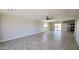 Bright, open living area with wood-look tile flooring, recessed lighting, and ceiling fans at 4219 W Citrus Way, Phoenix, AZ 85019