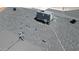 Close up on a roof top featuring new shingles, vents, and a modern HVAC system at 4219 W Citrus Way, Phoenix, AZ 85019