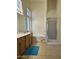 Inviting bathroom features dual sinks, a soaking tub, and a separate shower, perfect for relaxation at 4322 E Cottonwood Ln, Phoenix, AZ 85048