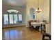 Bright dining room featuring arched window with shutters and chandelier at 4322 E Cottonwood Ln, Phoenix, AZ 85048