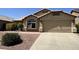 Charming home with well-maintained landscaping and a welcoming front facade at 4322 E Cottonwood Ln, Phoenix, AZ 85048