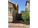 Cozy entryway featuring a private courtyard gate and desert landscaping at 4322 E Cottonwood Ln, Phoenix, AZ 85048