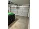 Spacious garage with white door, offering ample storage and parking at 4322 E Cottonwood Ln, Phoenix, AZ 85048