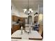 Well-appointed kitchen with stainless steel appliances, wooden cabinetry, and a functional island at 4322 E Cottonwood Ln, Phoenix, AZ 85048