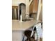Corner of kitchen with barstool seating and lots of counter space at 4322 E Cottonwood Ln, Phoenix, AZ 85048