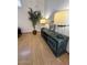 Living room with dark green console table, tree and stylish lamps at 4322 E Cottonwood Ln, Phoenix, AZ 85048