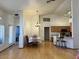 Open floorplan with view of dining area, kitchen, and exit to patio at 4322 E Cottonwood Ln, Phoenix, AZ 85048