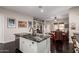 Spacious kitchen with island that seamlessly transitions into the living room, great for entertaining at 4565 N Point Ridge Rd, Buckeye, AZ 85396