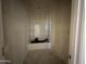 An unfinished bathroom with a new bathtub ready for custom finishes and design at 47214 W Cansados Rd, Maricopa, AZ 85139