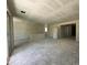 A bright living space is ready for personalization with a sliding glass door and open layout at 47214 W Cansados Rd, Maricopa, AZ 85139