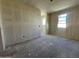 Spacious living room features large windows, offering abundant natural light and ventilation at 47214 W Cansados Rd, Maricopa, AZ 85139