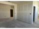 Open-plan living space with multiple entry points, perfect for seamless transitions and entertaining at 47214 W Cansados Rd, Maricopa, AZ 85139