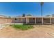 Backyard with covered patio, providing ample shade and space for outdoor living and entertaining at 5022 W Pierson St, Phoenix, AZ 85031