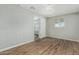 Bright bedroom features wood-style floors, neutral walls and attached closet at 5022 W Pierson St, Phoenix, AZ 85031
