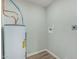 Utility room featuring a water heater and water hookups at 5022 W Pierson St, Phoenix, AZ 85031