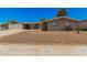 Charming single story home with a front yard and covered parking at 5738 W Heatherbrae Dr, Phoenix, AZ 85031