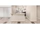 Kitchen with granite counters, tile floor and all white cabinets at 5738 W Heatherbrae Dr, Phoenix, AZ 85031
