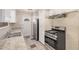 Modern kitchen featuring sleek stainless steel appliances and ample counter space at 5738 W Heatherbrae Dr, Phoenix, AZ 85031