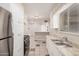 View of the kitchen with stainless steel appliances and view to adjacent room at 5738 W Heatherbrae Dr, Phoenix, AZ 85031