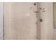 A clean shower featuring a standard shower head and tiled walls at 5738 W Heatherbrae Dr, Phoenix, AZ 85031