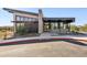 Modern building exterior featuring gray accents and stone facade at 5840 E Covey Ln, Phoenix, AZ 85054