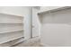 Walk-in closet featuring built-in shelves and closet rod at 5840 E Covey Ln, Phoenix, AZ 85054