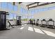 Bright fitness center with high ceilings, large windows, and modern workout equipment at 5840 E Covey Ln, Phoenix, AZ 85054