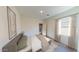 Bright bedroom with large window, neutral walls, and a spacious walk-in closet at 5840 W Coplen Farms Rd, Laveen, AZ 85339
