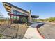 Modern building with unique architectural details, including stone accents and sleek window design at 5844 E Covey Ln, Phoenix, AZ 85054