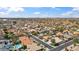 Aerial view showcasing the expanse of a residential neighborhood, complete with streets and homes at 6164 E Greenway Ln, Scottsdale, AZ 85254