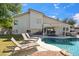 Relaxing pool and backyard seating with lush landscaping create a private oasis at 6164 E Greenway Ln, Scottsdale, AZ 85254