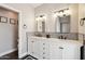 Stylish bathroom with double sink vanity, quartz countertop, and modern fixtures at 6164 E Greenway Ln, Scottsdale, AZ 85254