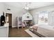 bedroom with stylish bunkbed, ceiling fan and a large window at 6164 E Greenway Ln, Scottsdale, AZ 85254