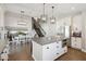 Spacious kitchen with a center island, modern appliances, and a cozy dining area nearby at 6164 E Greenway Ln, Scottsdale, AZ 85254