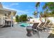 Sparkling backyard pool and lounge area with desert landscaping perfect for entertaining and relaxing at 6164 E Greenway Ln, Scottsdale, AZ 85254