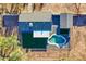 A lovely aerial view of a house with a pool, lawn, and other hardscape elements at 639 N 102Nd Pl, Mesa, AZ 85207