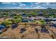 Desert community with homes, desert landscaping, and swimming pool at 639 N 102Nd Pl, Mesa, AZ 85207