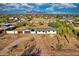 Charming home with detached garage, desert landscaping, and mountain views at 639 N 102Nd Pl, Mesa, AZ 85207