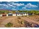 Spacious property showcasing the house, garage, and beautiful desert landscaping with mountain views at 639 N 102Nd Pl, Mesa, AZ 85207