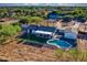 Aerial view featuring a refreshing backyard pool and patio area at 639 N 102Nd Pl, Mesa, AZ 85207