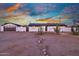 Wide shot of the beautiful one-story home at sunset at 639 N 102Nd Pl, Mesa, AZ 85207