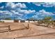 View of home with detached garage, featuring desert landscaping, a new roof, and a fresh exterior paint job at 639 N 102Nd Pl, Mesa, AZ 85207