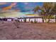 Charming single-story home with desert landscaping, featuring cacti and a well-maintained facade at 639 N 102Nd Pl, Mesa, AZ 85207