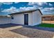 Versatile outbuilding with brick and gravel landscaping at 639 N 102Nd Pl, Mesa, AZ 85207