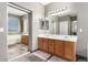 Bathroom featuring double sinks and a double-wide mirror at 6505 S 15Th Dr, Phoenix, AZ 85041